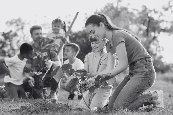 Couple planting a tree together